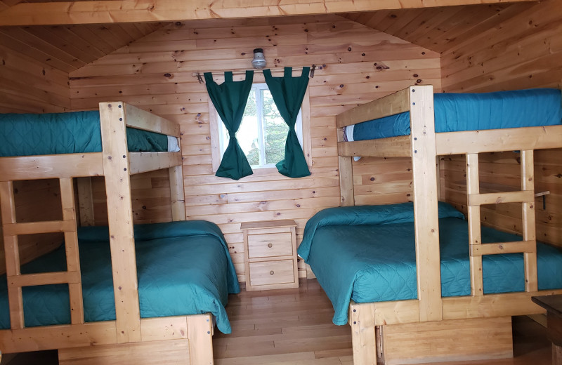 Cabin bedroom at The Birches Resort.