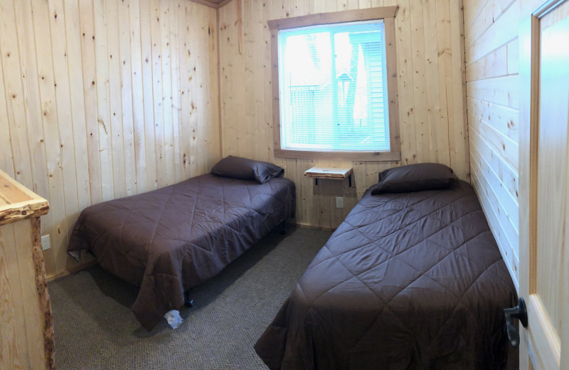 Cabin bedroom at Vacationland Resort.