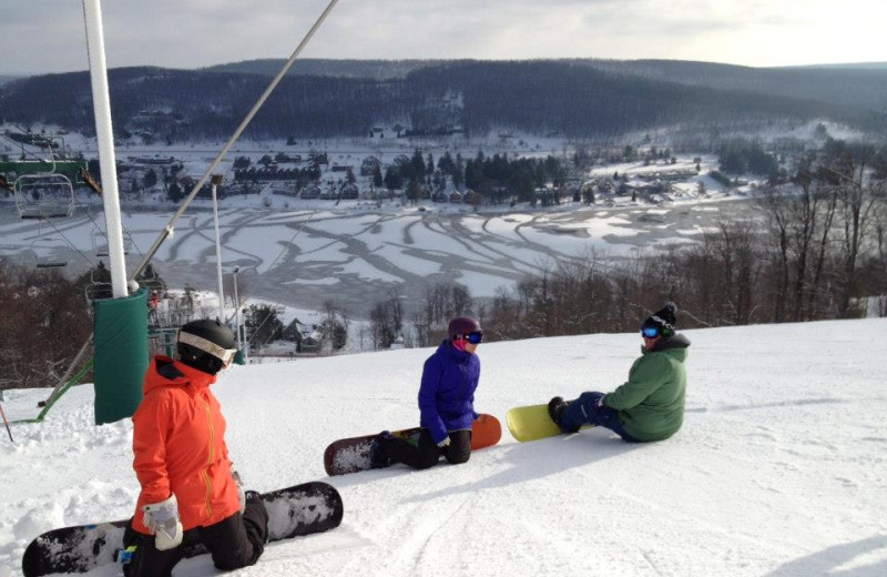 Friends Snowboarding at Wisp Resort