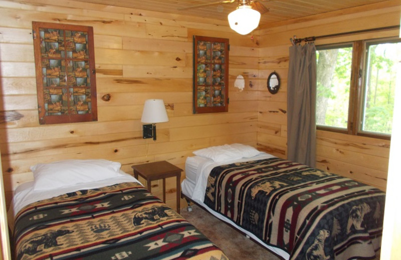 Cabin bedroom at Cedar Point Resort.