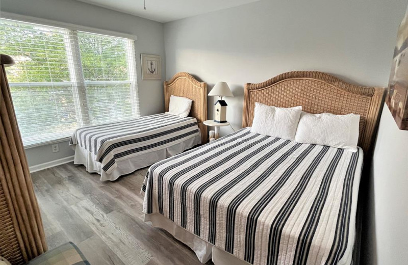 Rental bedroom at Williamson Vacation Rentals.