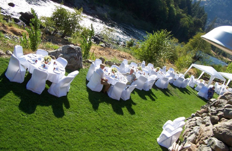 Wedding by river at Strawhouse Resorts.
