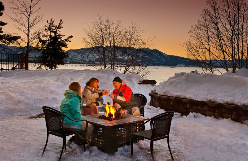 Relaxing by the fire at Aston Lakeland Village.