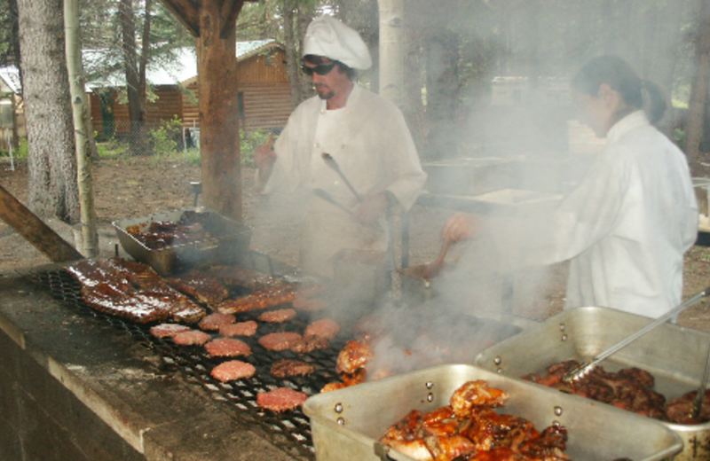 Grilling hamburgers at Harmels Ranch Resort.