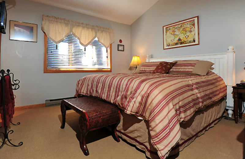 Vacation rental bedroom at Deerfield Village Resort.