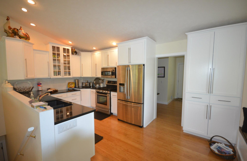 Rental kitchen at Visit Up North Vacation Rentals.