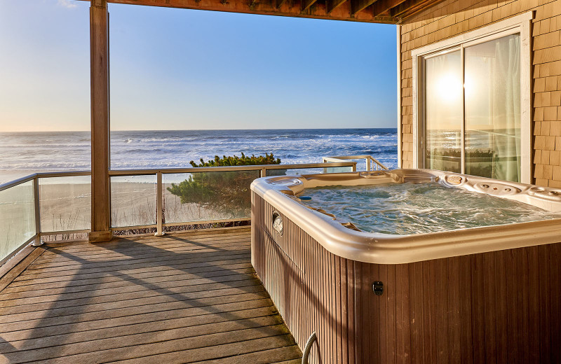 Deck hot tub at Admiral's Beach Retreat.