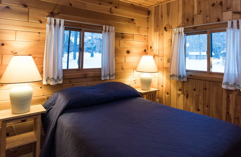 Cabin bedroom at Pitlik's Sand Beach Resort.