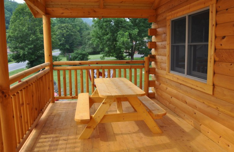 Deck at Harman's Luxury Log Cabins.