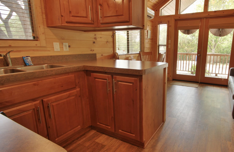 Cabin kitchen at Yogi Bear's Jellystone Park Hill Country.