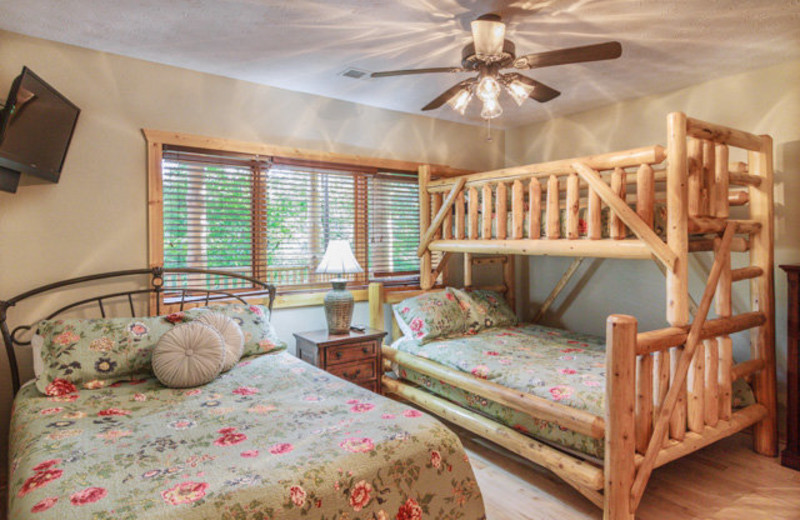 Rental bedroom with bunk beds at Stony Brook Cabins, LLC.