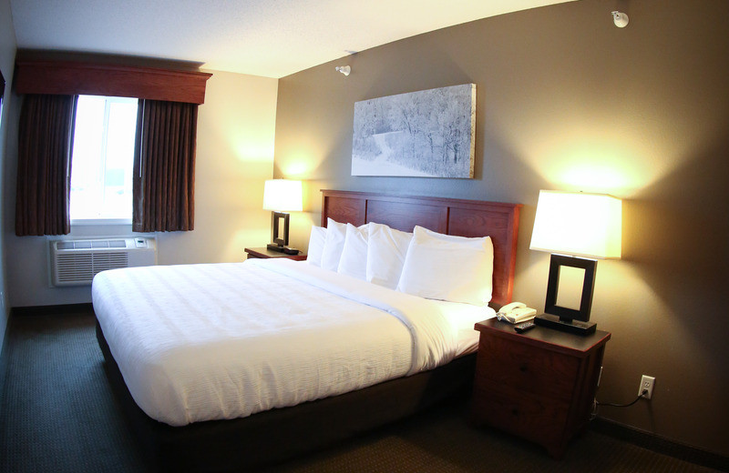 Guest room at GrandStay Perham.