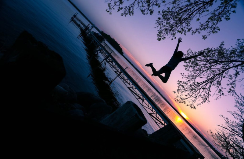Jumping in lake at Kohl's Resort.
