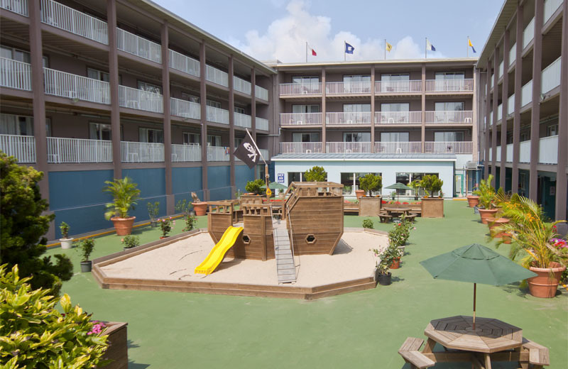 Children's playground in courtyard at Flagship Oceanfront Hotel Ocean City.