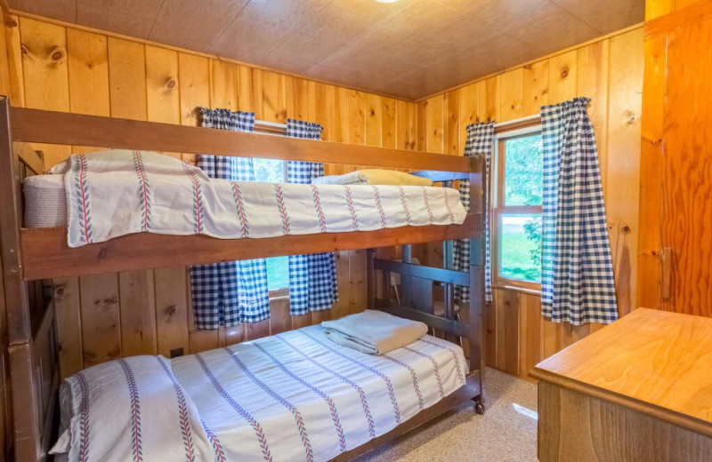 Cottage bedroom at Fisher's Lakeside Cottages.