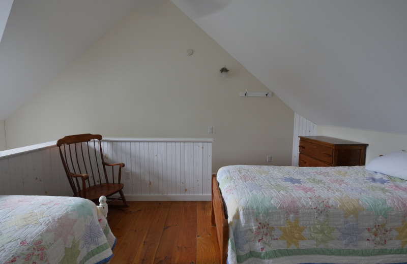 Cottage bedroom at Sunapee Harbor Cottages.