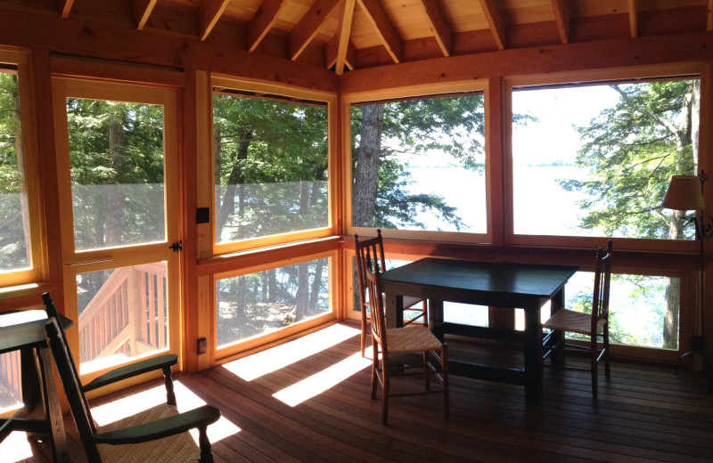 Cabin porch at Rockywold-Deephaven Camps.