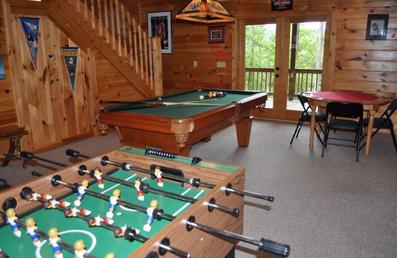 Cabin game room at Cuddle Up Cabin Rentals.