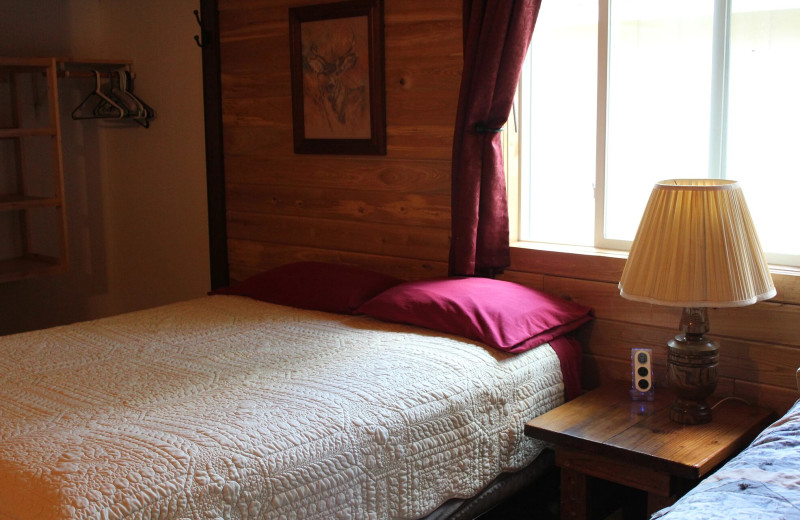 Cabin bedroom at Pine Beach Resort-Side Lake.