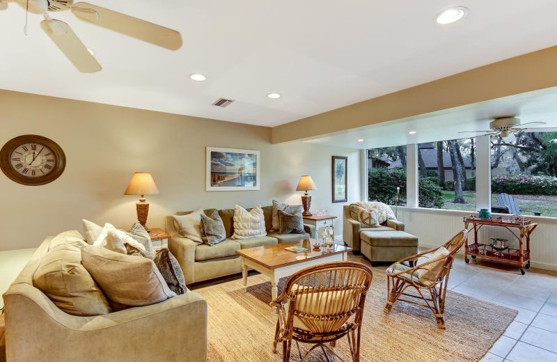 Rental living room at Amelia Rentals and Management Services.