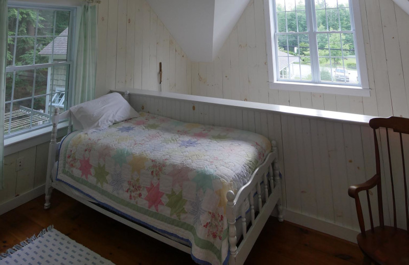 Cottage bedroom at Sunapee Harbor Cottages.