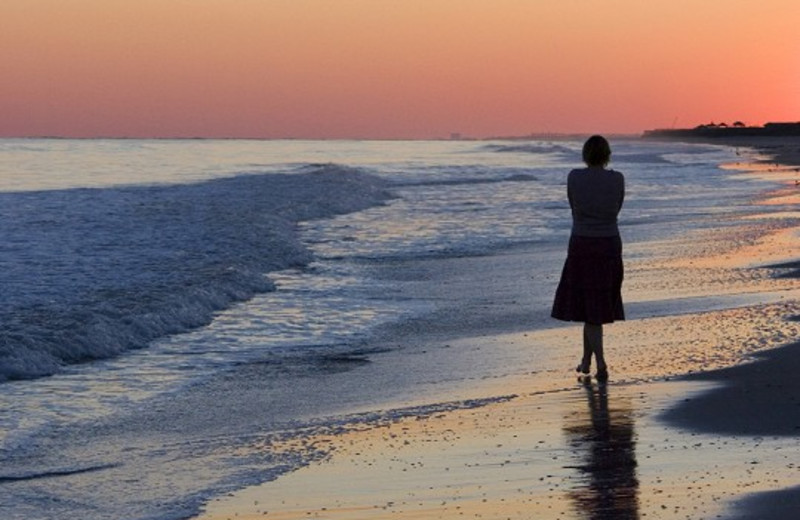 Walking on beach at Ocean Isle Inn.