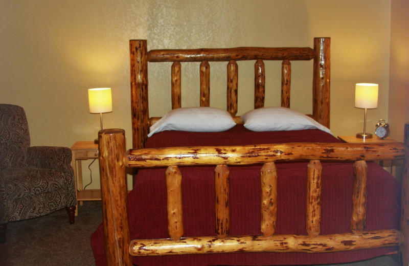 Cabin bedroom at Sleepy Bear Cabins.