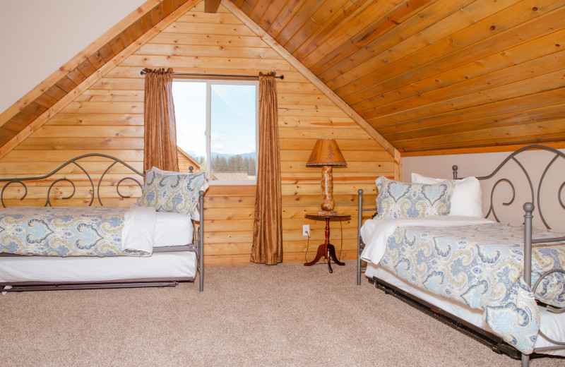 Cabin bedroom at Gentry River Ranch.