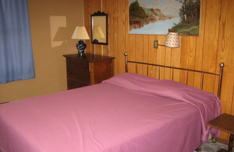 Cabin bedroom at Sand Bay Resort.