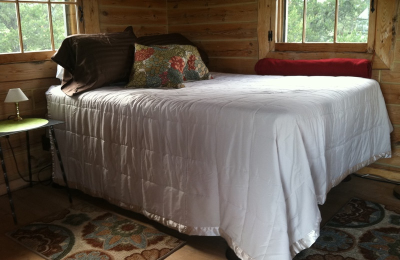 Cabin bedroom at Black Lantern Resort and Retreat.