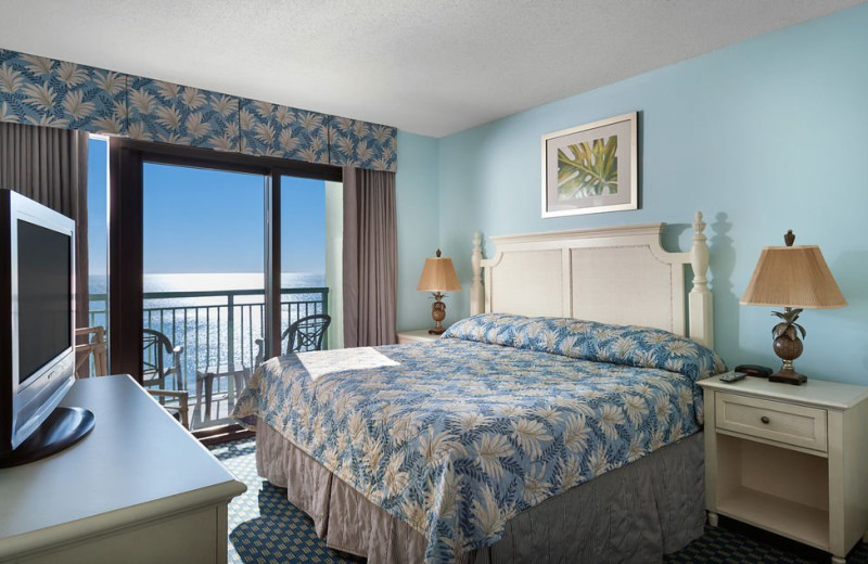 Guest room at Caribbean Resort & Villas.