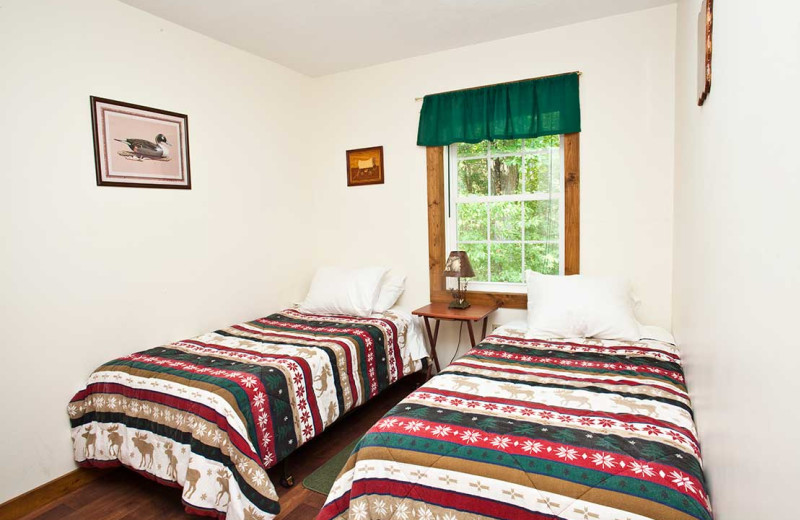 Cabin bedroom at Willowbrook Cabins.