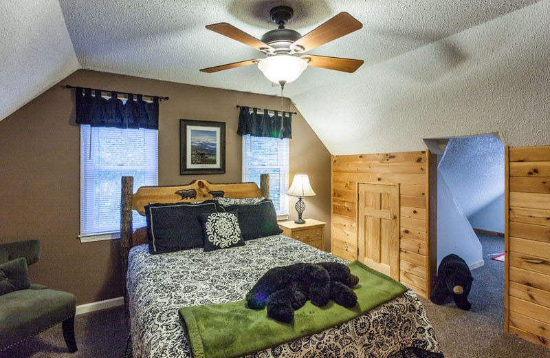 Cabin bedroom at Mountain Oasis Cabin Rentals.