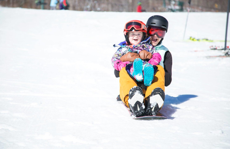 Sledding at The Golden Eagle Lodge.