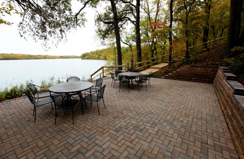 Outside patio with lake view at East Silent Lake Vacation Homes.