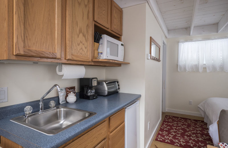 Cottage kitchenette at Sunapee Harbor Cottages.