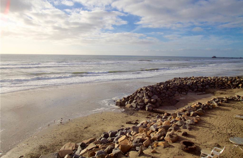 The beach at Vacation Rentals by McLain Properties.