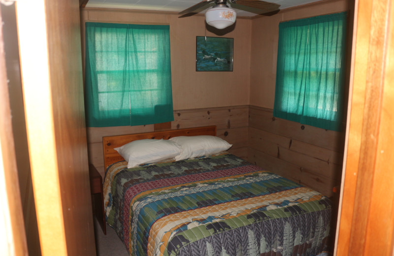 Cabin bedroom at Four Seasons Resort.