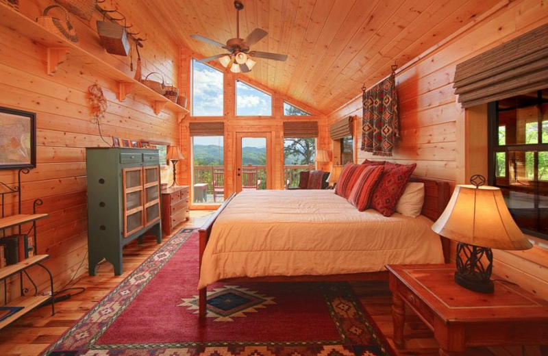 Cabin bedroom at Cabin Fever Vacations.