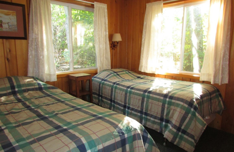 Cabin bedroom at Pine Aire Resort.