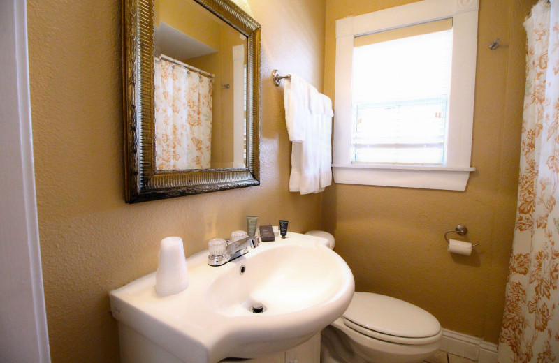 Guest bathroom at Peach Tree Inn & Suites.