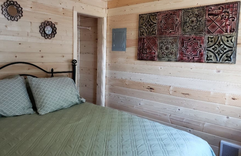 Cabin bedroom at Silver Beach Resort.
