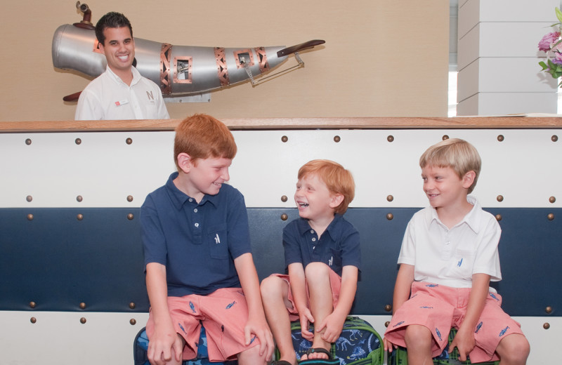 Family at front desk at The Nantucket Hotel and Resort.