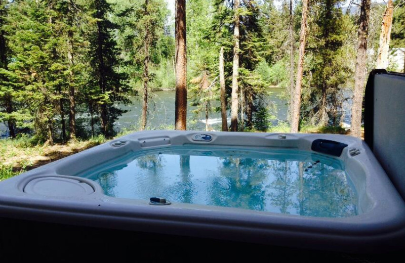 Cabin hot tub at Natapoc Lodging.