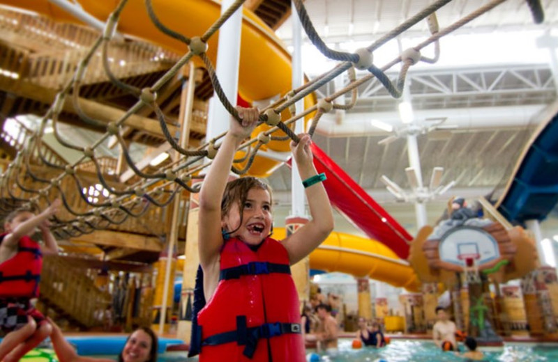 Crossing the monkey bars at Kalahari Waterpark Resort Convention Center.