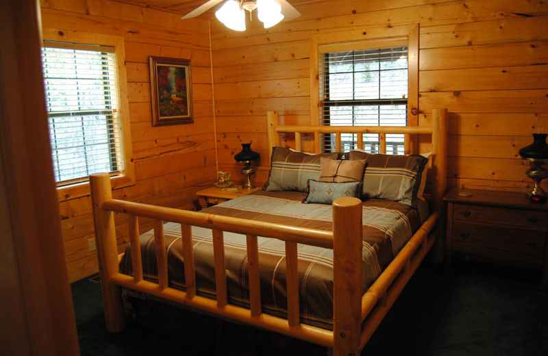 Cabin bedroom at Cabin Fever Resort.