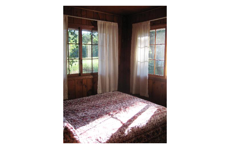 Cabin bedroom at Birch Grove Resort.