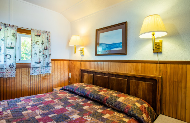 Cabin bedroom at Oceanside Ocean Front Cabins.