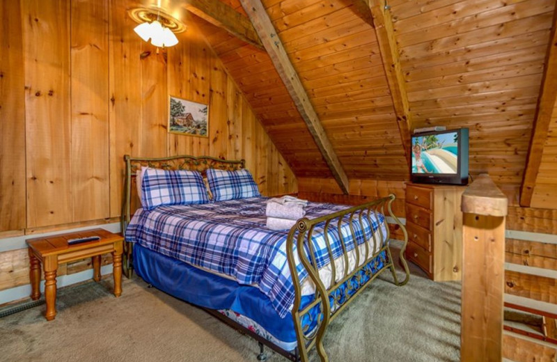 Cabin bedroom at TNT Cabin Rentals.