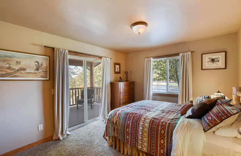 Cabin bedroom at Gentry River Ranch.